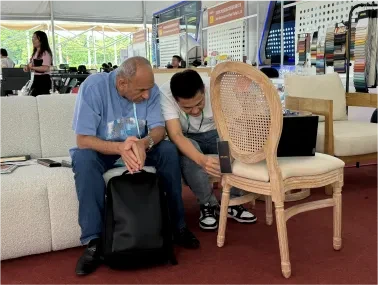 Maxwell team at wedding furniture trade show and industry exhibition Maxwell team at wedding furniture trade show and industry exhibition